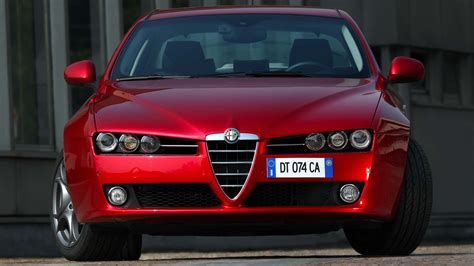 Download Sleek Alfa Romeo 159 On The Road Wallpaper