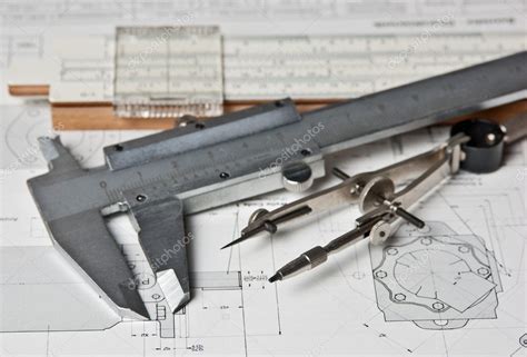 Engineering tools on technical drawing Stock Photo by ©Observer 9260432