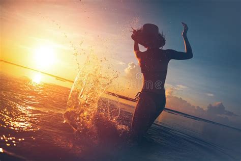 Woman`s Silhouette Splashing In Water Stock Image Image Of Enjoy