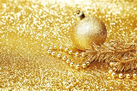 Shiny Golden Christmas Decor Over Glitter Background And Picture For