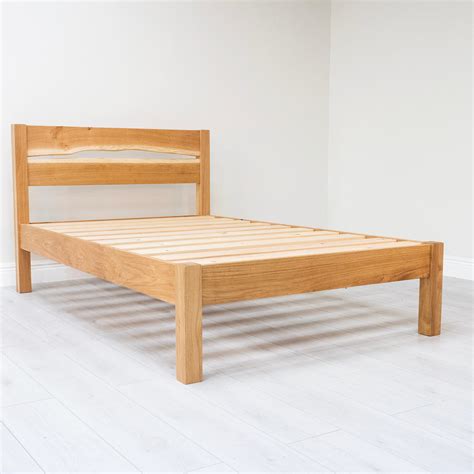 oak bed frames   wooden bed company  year guarantee