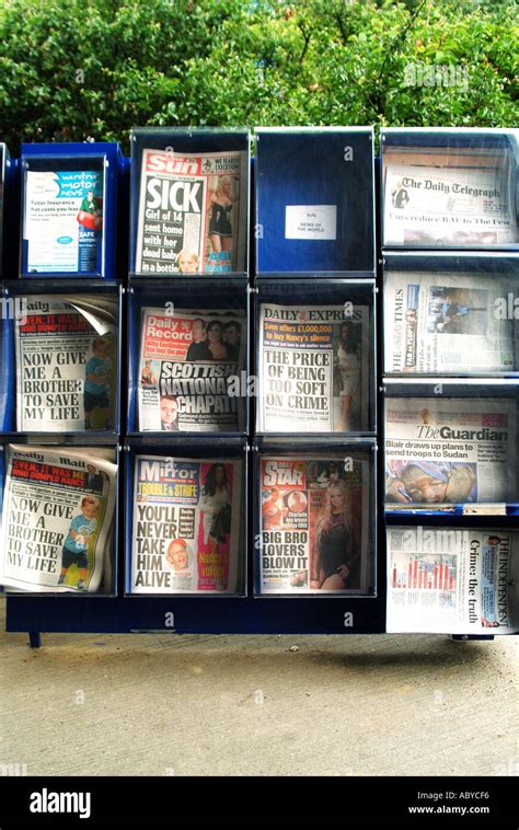 Selection Of Daily Uk National Newspapers In Outdoor Self Service Rack