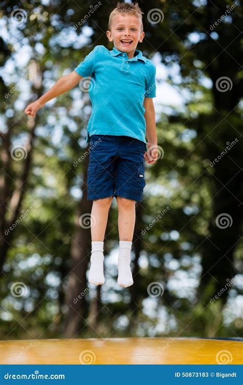 Boy At Trampoline Stock Image Image Of Moving Laughing 50873183