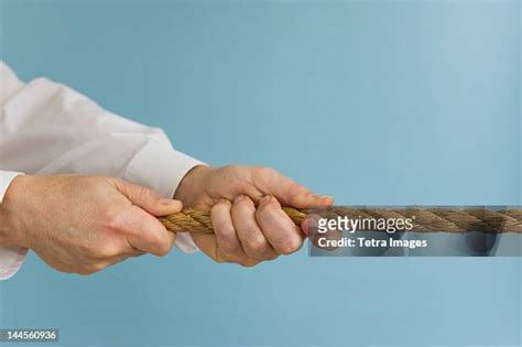 Tug Of War And Hands Photos And Premium High Res Pictures Getty Images