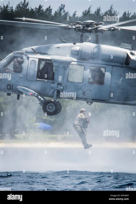 A Sailor Assigned To Explosive Ordnance Disposal Mobile Unit 5 EODMU5