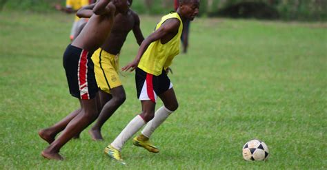 Black Teenage Boys Playing Soccer · Free Stock Photo