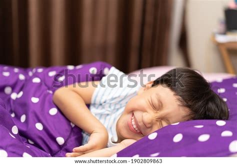 Boy Pretends Sleep On Bed Stock Photo 1902809863 Shutterstock