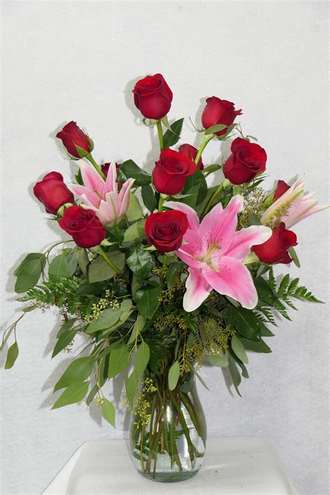 Dozen Red Roses With Stargazer Lillies In Fresno Ca D And L Roses