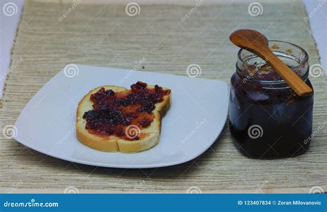 Plum jam and bread stock photo. Image of famine, dining - 123407834