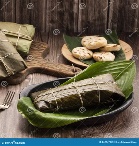 Traditional Colombian Tamales Wrapped In Green Banana Leaves Stock