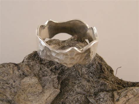 Sterling Silver Ring That Is Uniquely Shaped With Deep Scalloped Edges