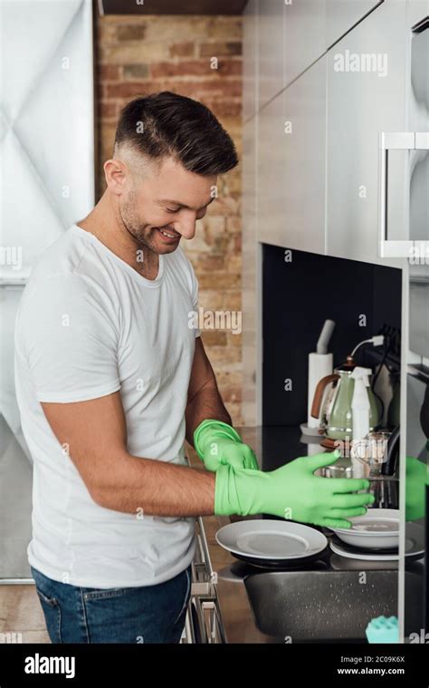 Man Wearing Rubber Gloves Hi Res Stock Photography And Images Alamy