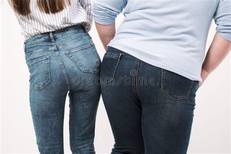 Two Girls Fat And Slender Show The Backs Of Their Into The Camera Comparison Of Two Butts