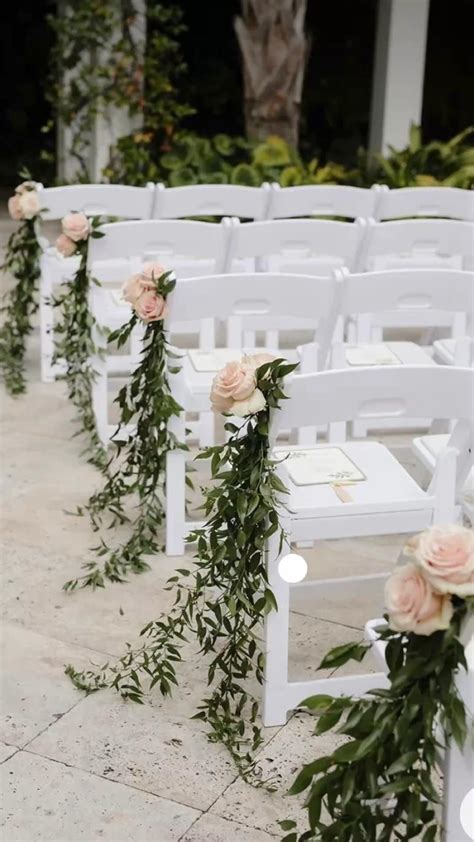 White Pillar Candles And Greenery Atop Cocktail Tables Artofit