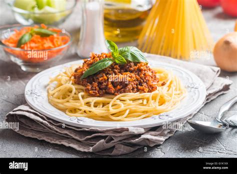 Spaghetti bolognese with ingredients Stock Photo - Alamy