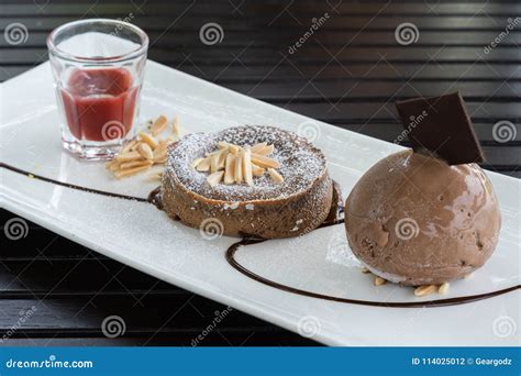 Chocolate Lava Cake with Ice Cream in Plate Stock Photo - Image of ...