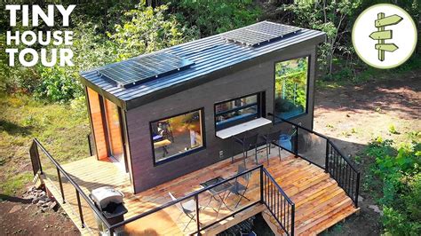 Off Grid Tiny House With Dual Bed Design And Garage Door Window Full