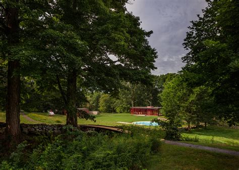 Yayoi Kusama Plasters Red Dots Across Philip Johnsons Glass House