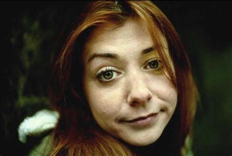 Happy Friday! Here's Alyson Hannigan rocking a more natural look. It's