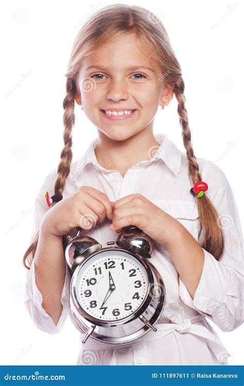 Cute Little Girl With Alarm Clock Isolated On White Background Stock