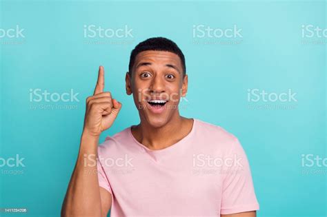 Photo Of Excited Funny Young Man Dressed Pink Tshirt Pointing Finger Empty Space Isolated