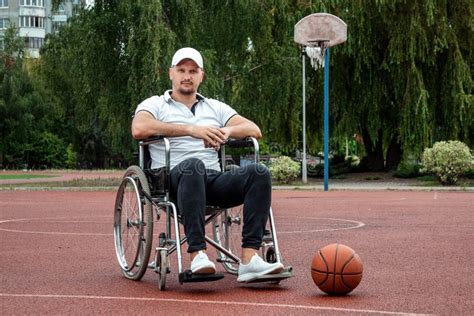 Dad Plays With His Disabled Son On The Sports Ground Concept