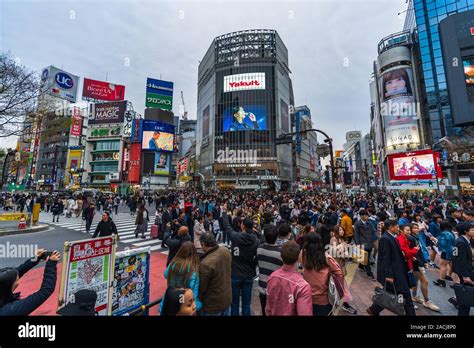 Tokyo Japan March Crowds Of People Walking Across At