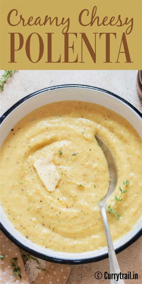 Creamy Cheesy Polenta In A White Bowl With A Spoon On The Side