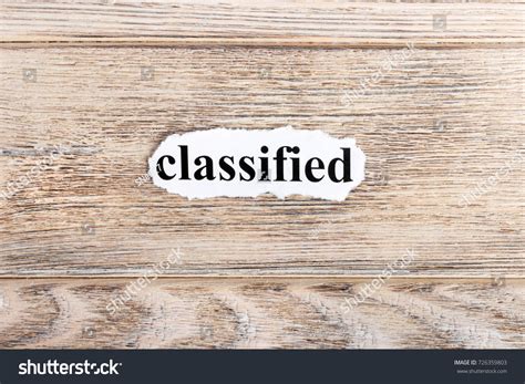 Classified Text On Paper Word Classified Stock Photo 726359803