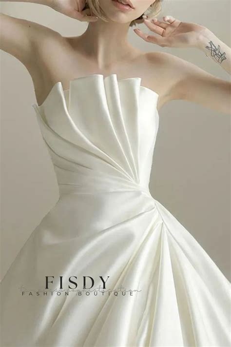 Fisdy Elegant Satin Wedding Gown Featuring A Regal Train And Refined