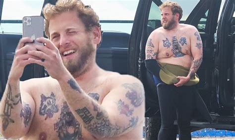 Jonah Hill Pulls Down His Wetsuit In Malibu To Show Off His Chest