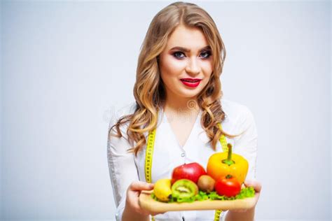 The Concept Of Healthy Eating And Diet Girl Holding Vegetables On