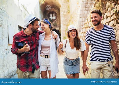 Group Of Tourists Traveling And Sightseeing Together Stock Image