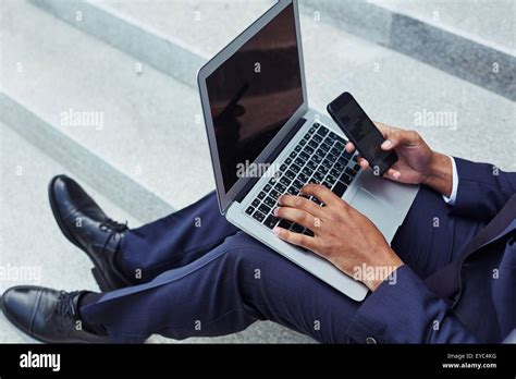 Modern Businessman Using Electronic Gadgets Stock Photo Alamy