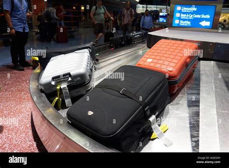 Baggage On Carousel In Airport Usa Stock Photo Alamy