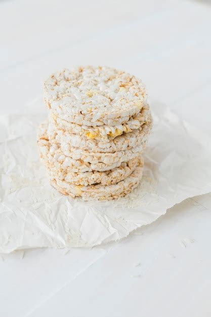 Free Photo Pile Of Puffed Rice Cakes On White Table