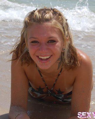 Pictures Of Sexy Lette Getting Naked On A Beach Porn Pictures XXX