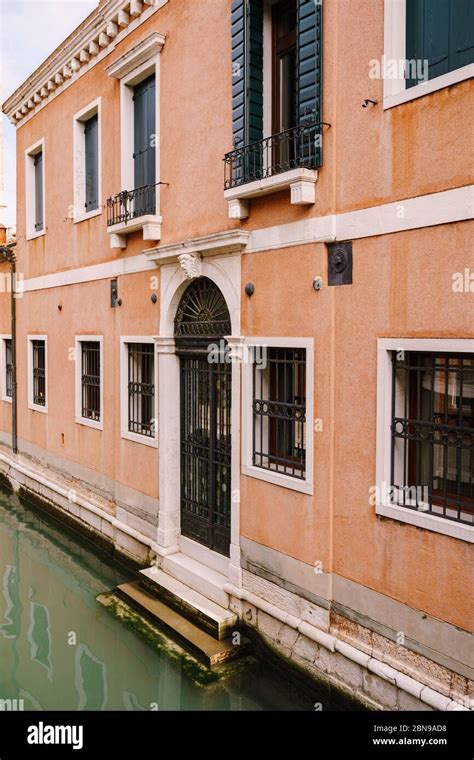 Close Ups Of Building Facades In Venice Italy A Two Story Building