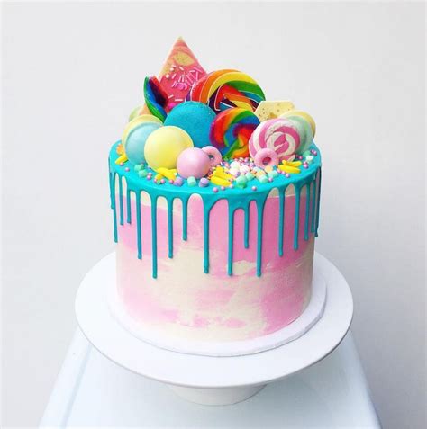 A Birthday Cake Decorated With Candy And Candies