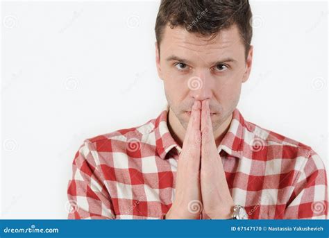 Closeup Portrait Young Man Praying Hands Clasped Hoping For Best Asking For Forgiveness Or ...