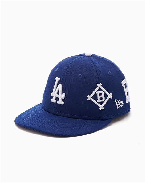 New Era La Dodgers Mlb All Over Logo Fifty Unisex Cap Blau