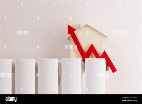 Cost Of Living Crisis Red Increasing Arrow On A Radiator Rising Cost Of Energy And Bills Stock