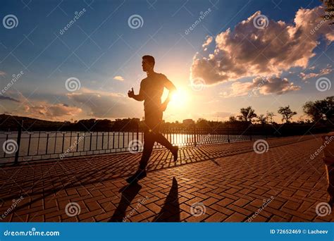 Running Man Silhouette In Sunset Time Stock Image Image Of Nature