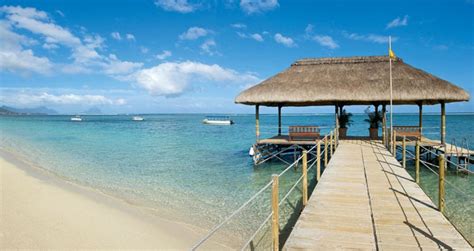 La Pirogue is set amongst vast tropical gardens spread along a stunning white sand beach on ...