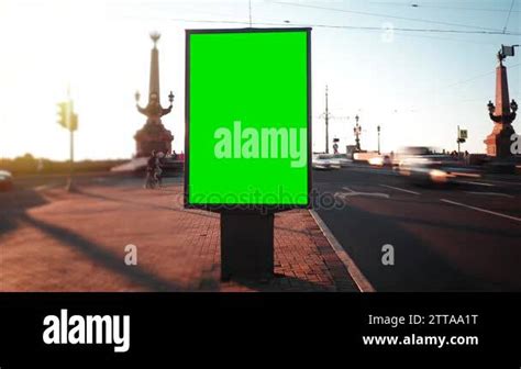 A Billboard With A Green Screen On A Busy Street Time Lapse Stock