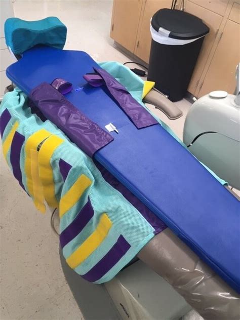 In Dental Care for Severe Autism, a Papoose Board Comes to the Rescue ...