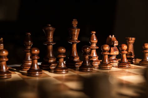 Browse Free HD Images of Dark Wooden Chess Pieces Against A Black ...