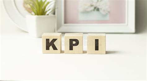 Kpi Word Written In Wooden Cubes Key Performance Indicator Stock Image