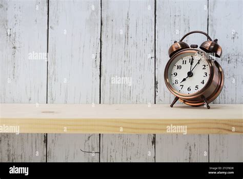 Vintage Alarm Clock With Space For Copy On Wooden Background Stock