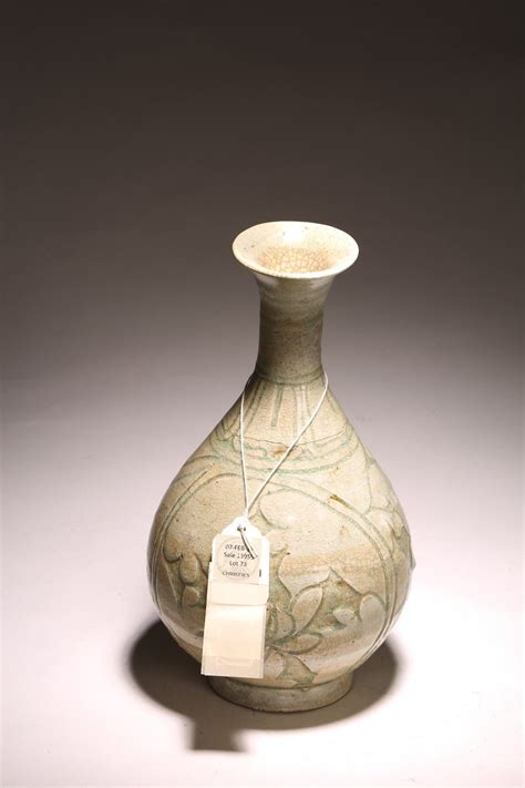 Bidlive A Chinese Celadon Glazed Yuhuchun Vase